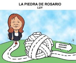 Caricature of a woman walking along a winding road toward a large tangled ball of white road strips labeled 'Derechos Humanos' on a green hill under a blue sky.