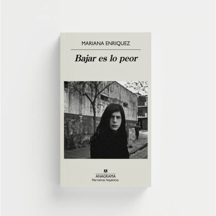 Book cover: 'Bajar es lo peor' by Mariana Enríquez, features a black-and-white photo of a woman on an urban street and the Anagrama logo at the bottom.